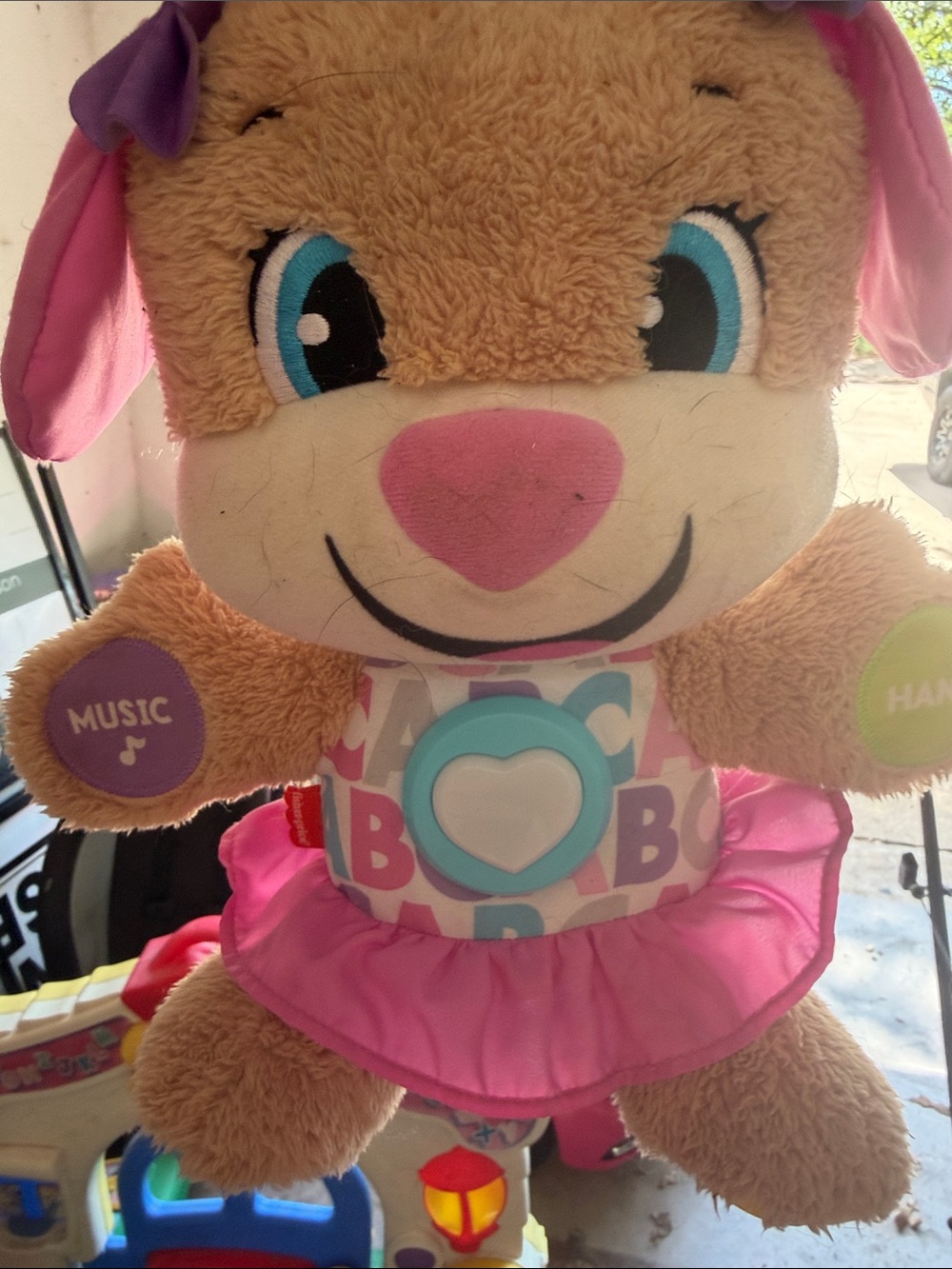 Plush Interactive Puppy Toy in Pink with Music Button